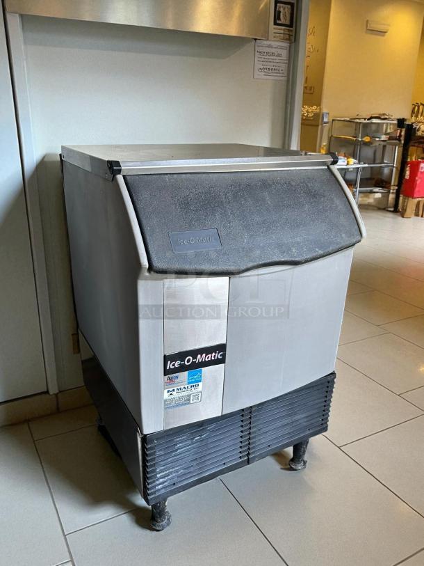 Ice-O-Matic ICEU220HA cube ice maker, undercounter model, tested and working. Silver exterior, branded label visible.