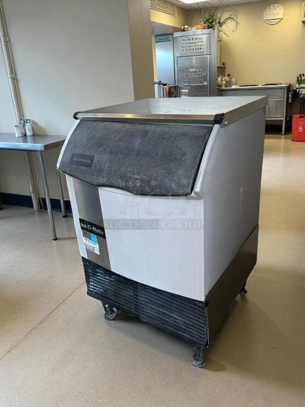 Ice-O-Matic ICEU220HA cube ice maker, undercounter model in working condition. Features Ice-O-Matic branding and labels.