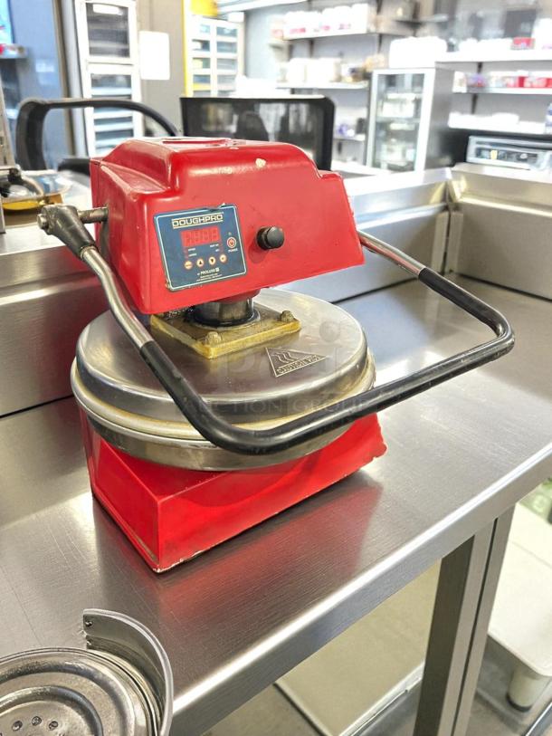 DoughPro DP1100 manual pizza dough press in great condition, red, tested and working, features digital display.