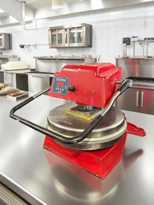 DoughPro DP1100 manual pizza dough press, red, in great condition. Tested and working, features control panel and sturdy handle.