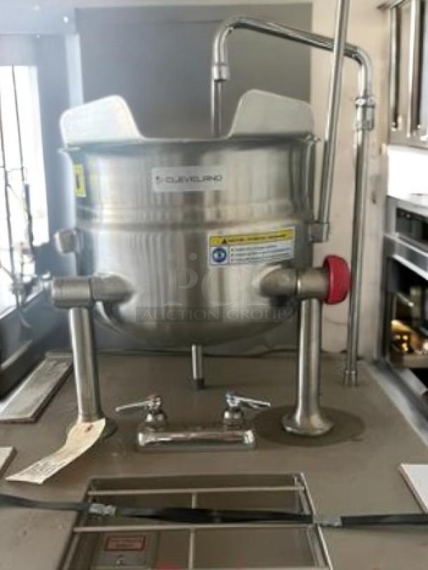 Brand new Cleveland KGL-40 gas stationary tilting kettle, 40-gallon, stainless steel, natural gas, fully tested, labeling visible.