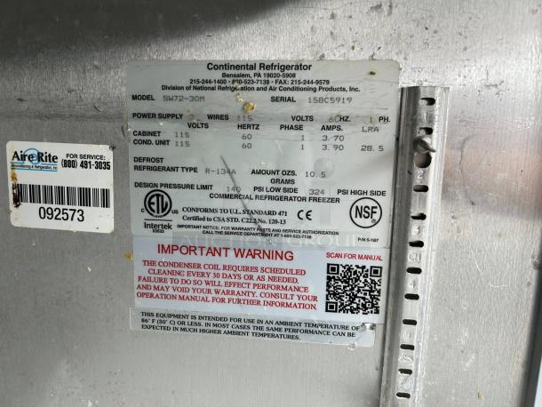Alt Text: Continental SW72-30M 72" Mighty Top Sandwich/Salad Prep Table label showing model, power supply, and warning details.