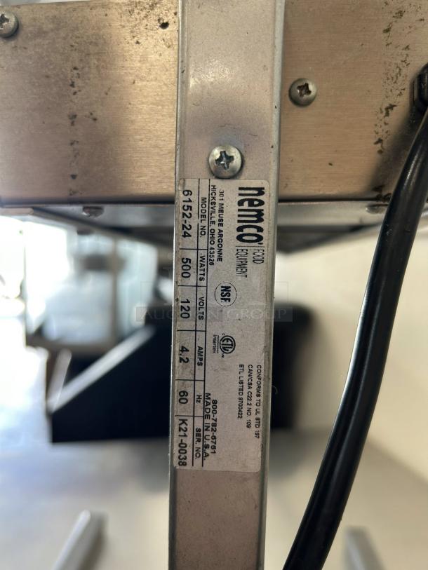 Nemco 6152-24 portable infrared food warmer label; shows model, 120V, 500W power, NSF certification, and Nemco USA details.