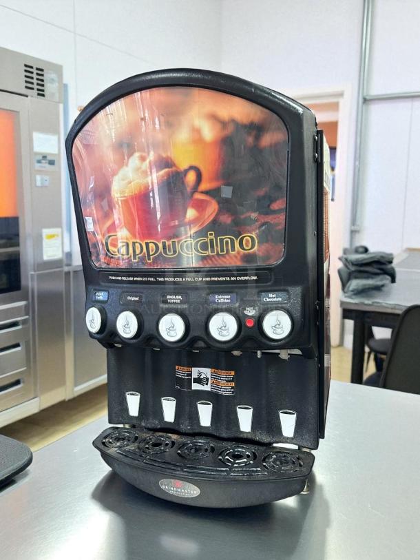 Grindmaster PIC5 beverage dispenser, five flavors, excellent condition, tested and working, cappuccino front graphic.