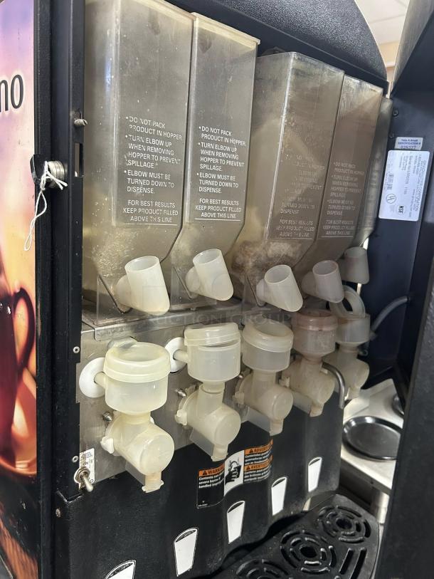 Grindmaster PIC5 beverage dispenser, excellent condition, five flavor capacity, visible hoppers and spouts, tested and working.
