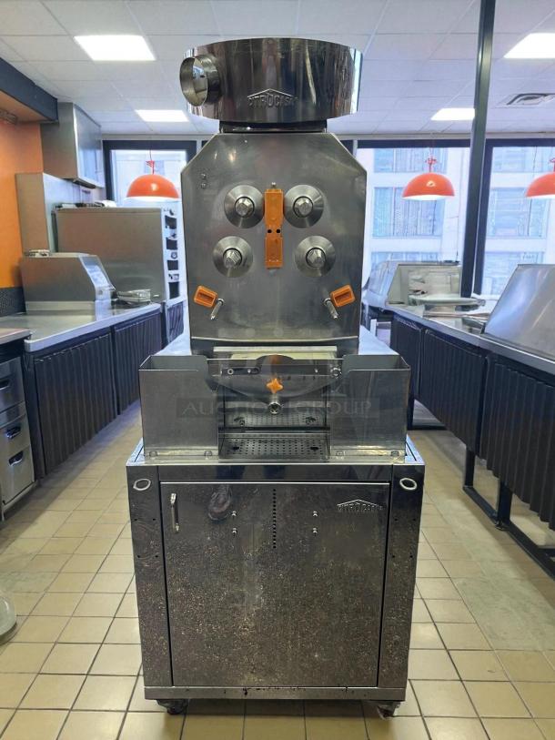 Citrocasa 8000 SB-ATS Advance Citrus Juicer, stainless steel, used condition, visible wear, large commercial size.