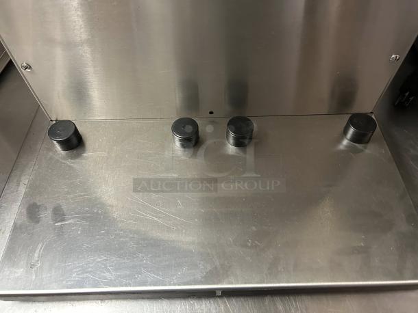 Bunn 38700.0013 Axiom APS Twin Airpot Coffee Brewer, stainless steel, tested and working, four control buttons visible.