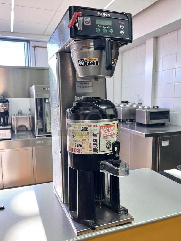 Bunn 38700.0010 AXIOM-DV-APS Dual Voltage Coffee Brewer in great condition, tested and working, with visible hot liquid warning label.