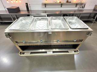 Duke E-4-CBSS stainless steel electric steam table, 4 sealed wells, 208V, tested, excellent condition.