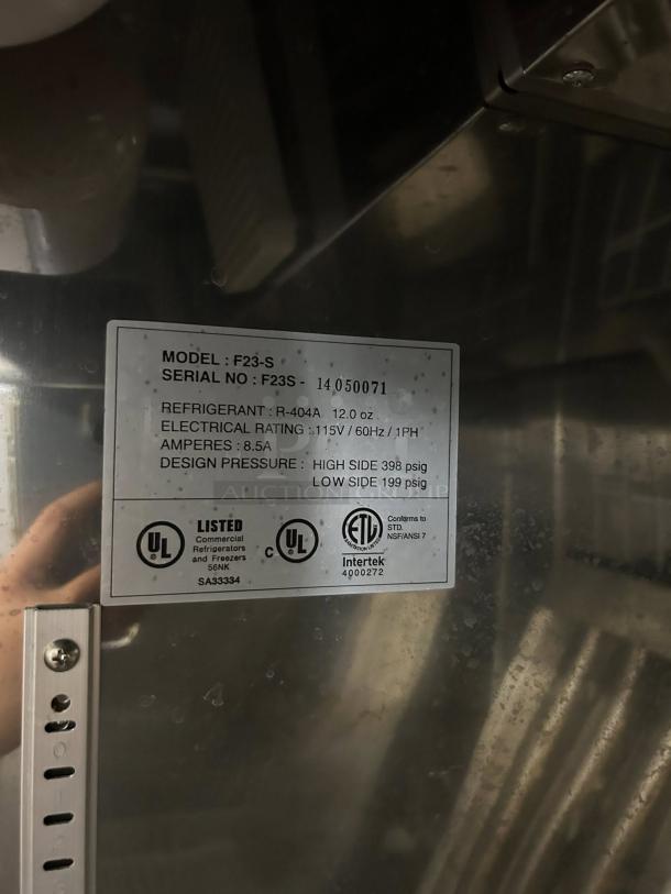 Norlake NLF23-S AdvantEDGE 28" Reach-In Freezer, 23 Cu. Ft., tested and working, label shows model, refrigerant, and UL listing.