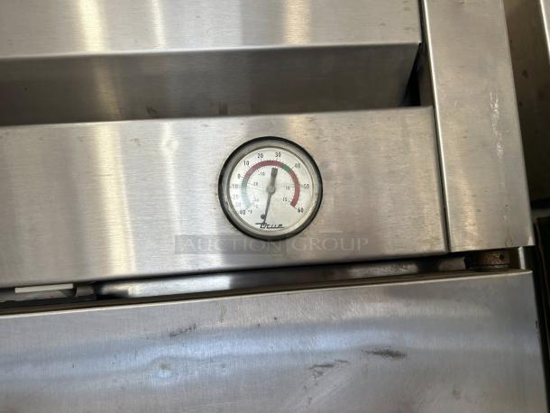 True T-49-HC Reach-In Refrigerator, excellent condition, stainless steel, with temperature gauge, hydrocarbon refrigerant.