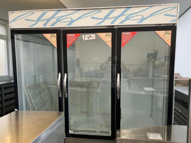 Beverage Air CRG74-1 refrigerator, 3 glass doors, great condition, tested and working, retail displays and shelving inside.