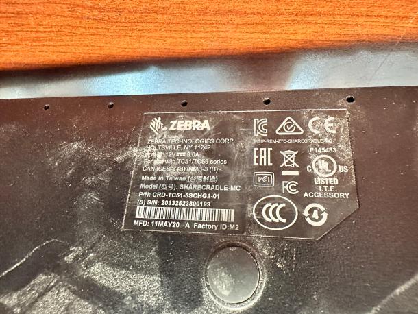 Zebra CRD-TC51-5SCHG-01 label showing product details and certifications; pristine condition; fully tested.