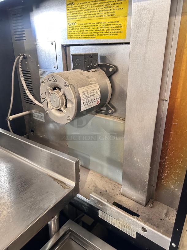 Southbend double-stack convection oven, natural gas, standard depth, superb condition, fully tested, visible maintenance labels.