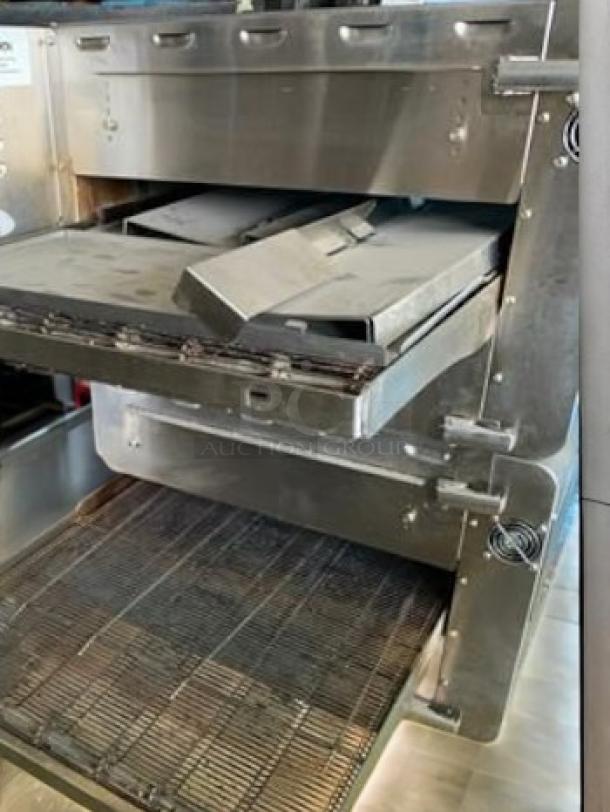 Superb condition Ovention C2000P-M Precision Conveyor Oven, 208/240V, stainless steel, fully tested and working.