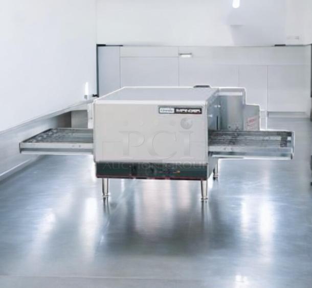 Lincoln Impinger 1301-11 countertop electric conveyor pizza oven in outstanding condition, model 208V, fully tested and working.