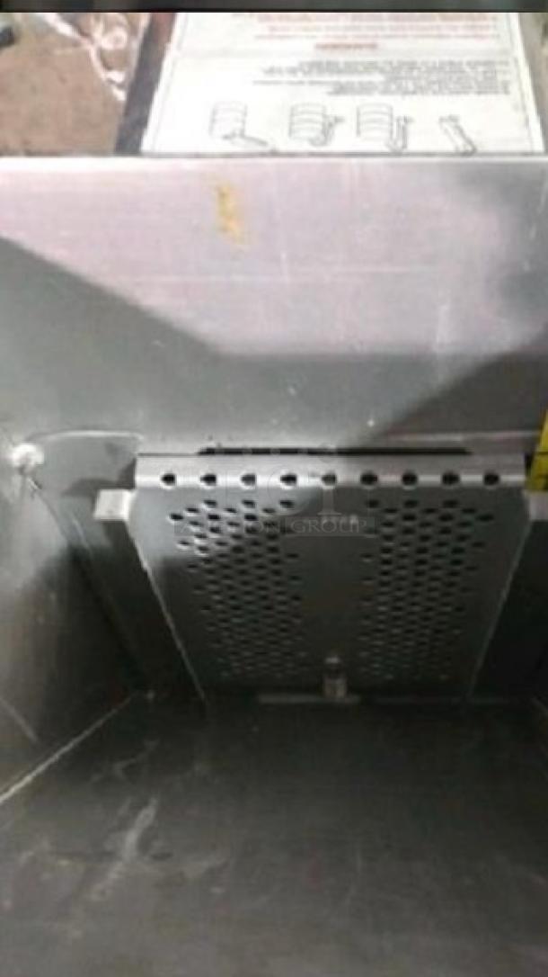 Frymaster shortening disposal shuttle, portable oil caddy, fully tested, gray metal finish, great condition, model label visible.