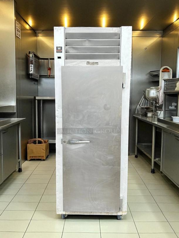 Traulsen G12010 30" reach-in freezer, single solid right-hinged door, tested and working, stainless steel, ideal for commercial use.