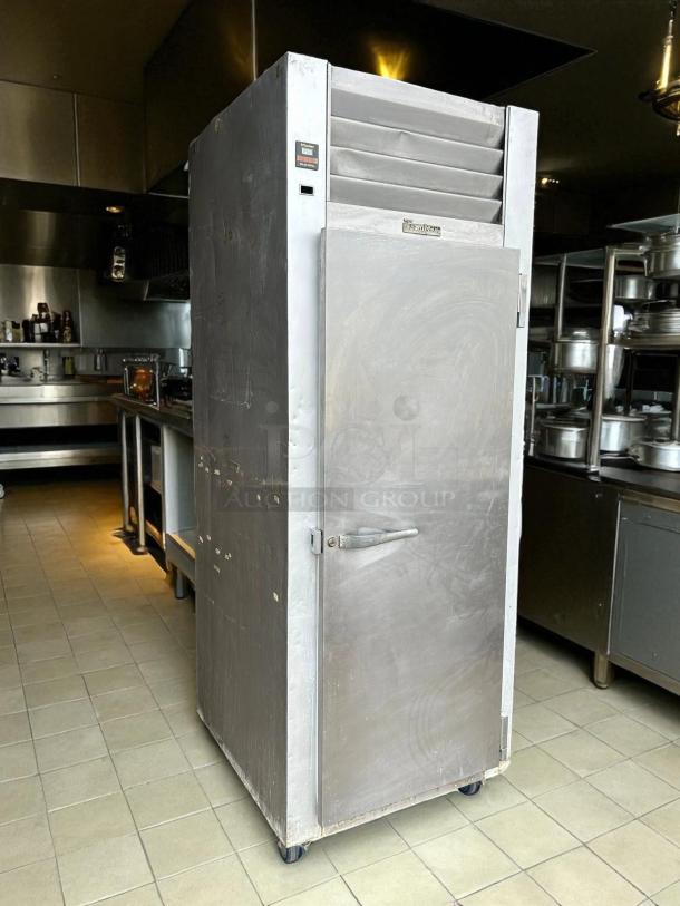 Traulsen G12010 30" reach-in freezer with right hinged door, tested and working, stainless steel exterior, used condition.