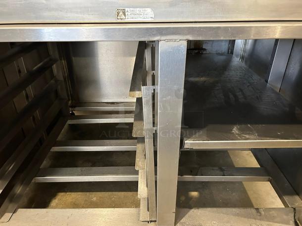Excellent condition Hobart OV400W-2 two-deck electric bakery oven, 220v, 3ph, with visible internal racks and safety warning label.