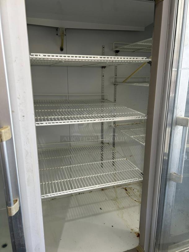 Blue Air BAGR72 3 Door Merchandising Refrigerator, excellent condition, tested and working, with adjustable shelving.