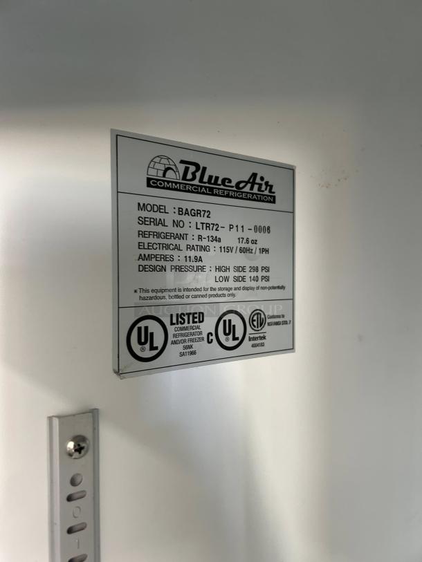 Blue Air BAGR72 3 Door Merchandising Refrigerator in excellent condition. Label details model, refrigerant, electrical rating, and UL listed status.
