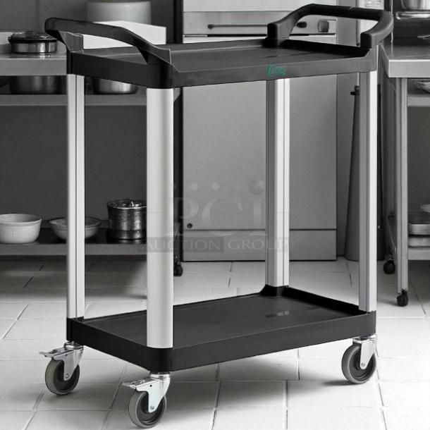 Brand new Choice small black 2-shelf bus cart in excellent condition. Durable utility/service design with casters.