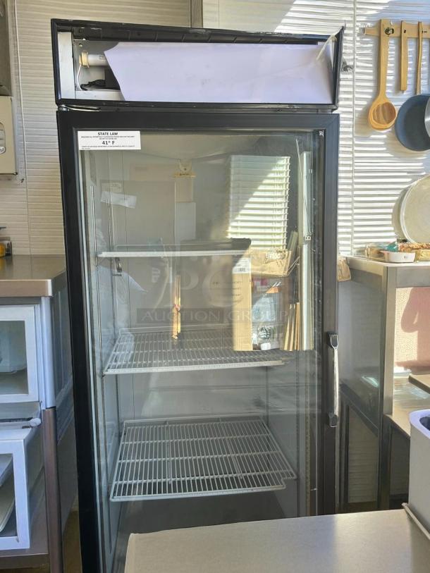 Everest EMGR24 single swing glass door refrigerator, tested, working, features adjustable shelves, temperature label at 41°F.