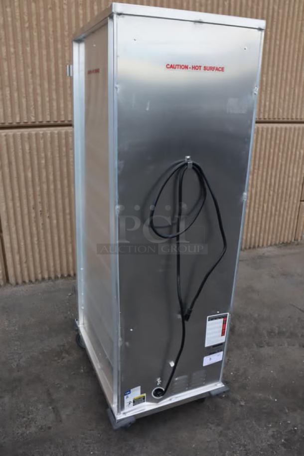 MainStreet Equipment CHP-1836U heated holding cabinet, scratch-n-dent, no door, metal exterior, caution label visible.