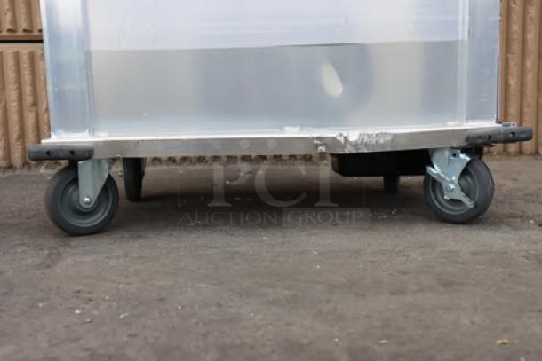 BRAND NEW MainStreet Equipment CHP-1836U Heated Cabinet, clear door missing, scratch-n-dent condition, on caster wheels.