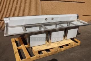 Regency 94" stainless steel commercial sink, model 600S31818218, with three compartments, cross bracing, and 2 drainboards; minor scratches.