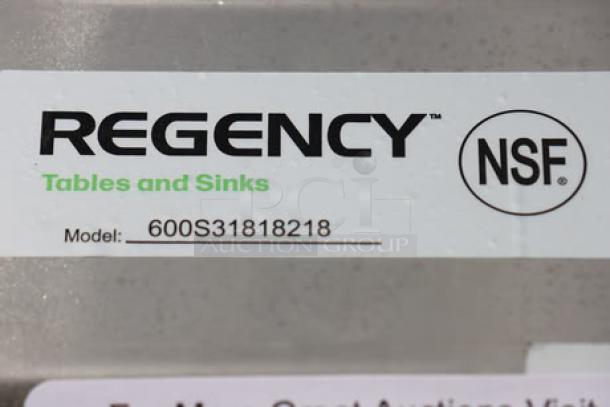 Regency 600S31818218 model label, NSF certified, part of a brand new stainless steel commercial sink with minor scratches.