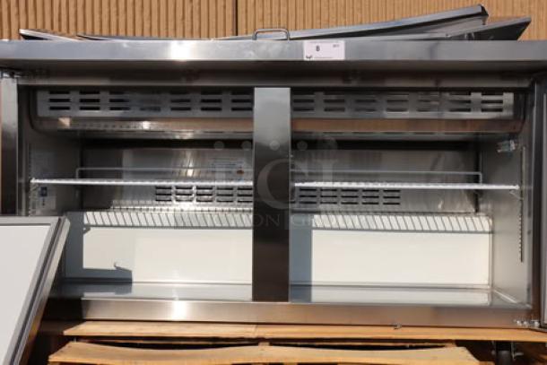 Brand new Avantco APT-60M-HC 60" 2-door mega top refrigerated sandwich prep table, 115V, 5.4A, 540W, small dents visible.