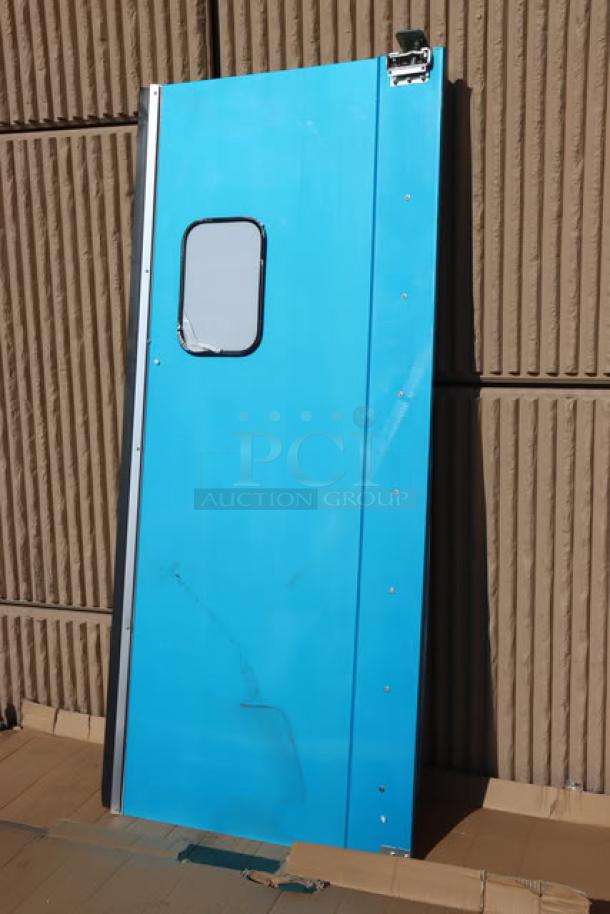 Brand new Regency 600TD3684 single aluminum swinging traffic door, 36"x84", with 9"x14" window, scratch-n-dent condition.