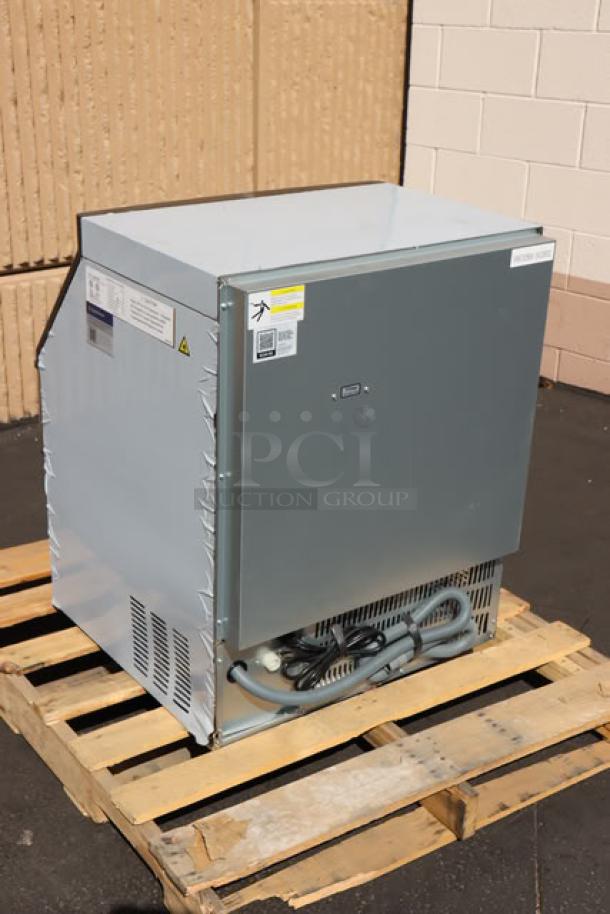 Avantco Ice UC-H-280-A undercounter ice machine, 26", air-cooled, 299 lb capacity. Brand new, missing front cover. S/N: 194UCH280A-24120032.
