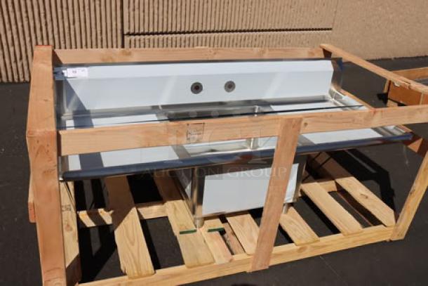 Brand new Regency 600S12323224 stainless steel two compartment sink with galvanized legs, 96" with 23"x23"x12" bowls, in crate.