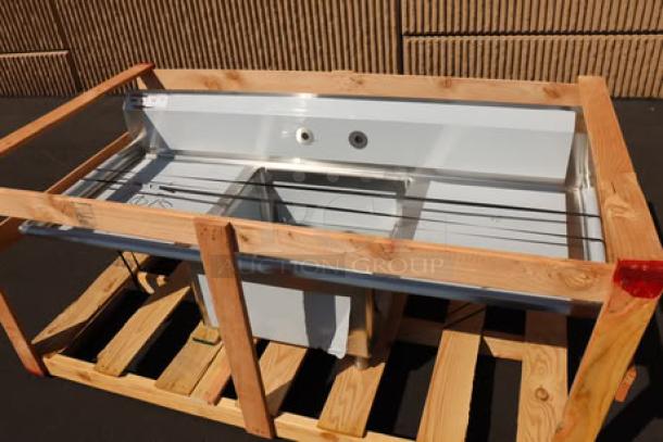 BRAND NEW Regency 600S12323224 96" stainless steel two-compartment sink with galvanized steel legs, 23" x 23" x 12" bowls, drainboards; may have scratches.