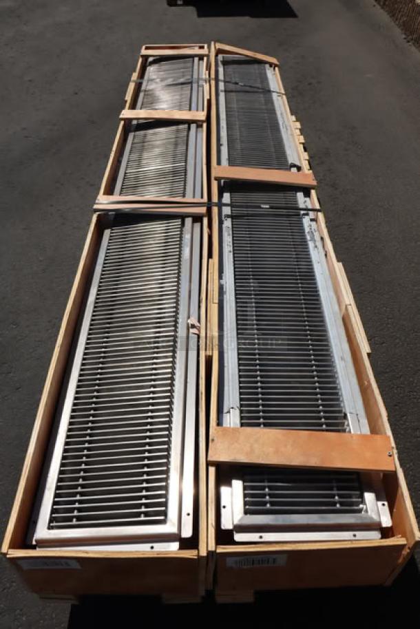 Regency 600FT12120SS 12" x 120" 14-gauge stainless steel floor trough with grate, minor scratches, wooden crates.