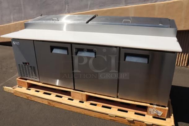 Avantco APPT-91-HC 92" 3 Door Refrigerated Pizza Prep Table, brand new, scratch-n-dent, on pallet, stainless steel.