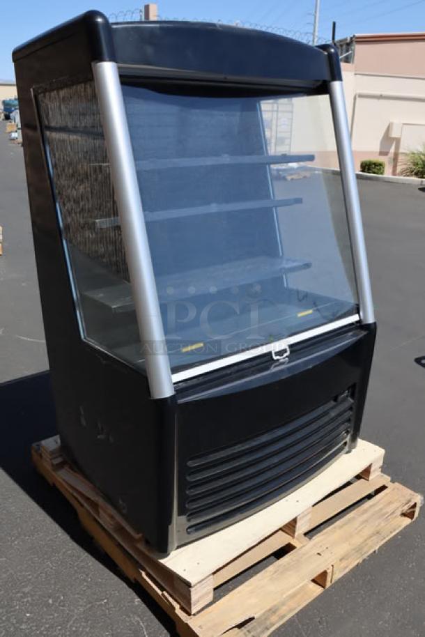 Brand new Avantco BMAC-36HC 36" Black Vertical Air Curtain Merchandiser with minor scratches. 115 Volts, 14.5 Amps.