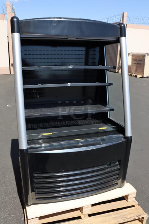 Brand new Avantco BMAC-36HC 36" black vertical air curtain merchandiser, showing shelving, scratch-n-dent condition.