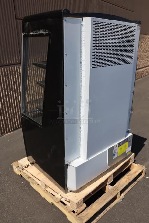 Brand new Avantco BMAC-36HC 36" black vertical air curtain merchandiser. Scratch-n-dent condition. Model label visible.