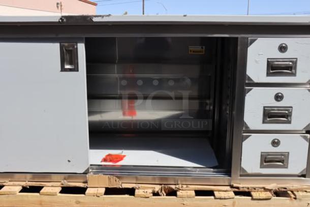 Regency 600EBT3072R 30" x 72" enclosed base stainless steel table with sliding doors and drawers, brand new, scratch-n-dent condition.