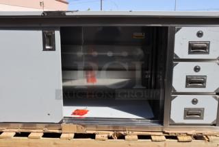 Regency 600EBT3072R 30" x 72" enclosed base stainless steel table with sliding doors and drawers, brand new, scratch-n-dent condition.