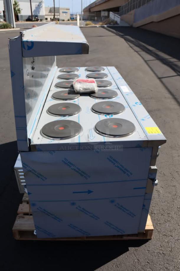 BRAND NEW Imperial Range Pro Series IR-12-E electric range with 12 round plates, 2 ovens, 208V, 3 Phase. Scratch-N-Dent condition.