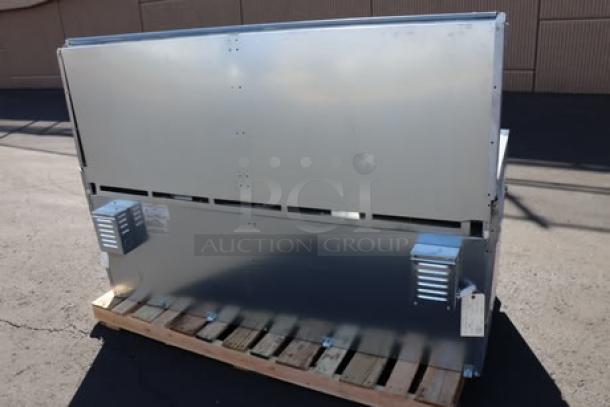 Brand new Imperial Range Pro Series IR-12-E 72" electric range back view, stainless steel, on wooden pallet.