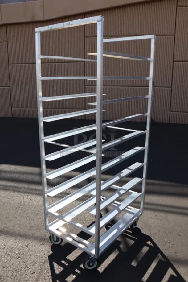 Brand new Channel T448A aluminum 20 tray cafeteria rack, scratch-n-dent, trapezoidal, bottom load, on wheels.