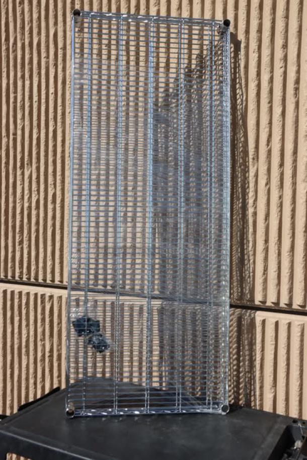 Regency 24"x60" chrome wire shelf, model 460EC2460, NSF certified. Minor scratching/denting. Includes mounting hardware.