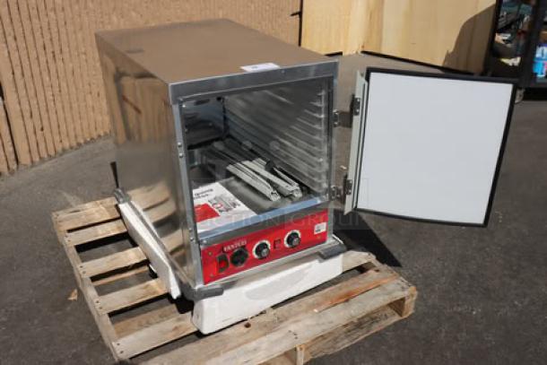 Brand new Avantco HPI-1812 heated holding cabinet, clear door, insulated, 120V, 1,575W, visible controls, tags indicate new condition.