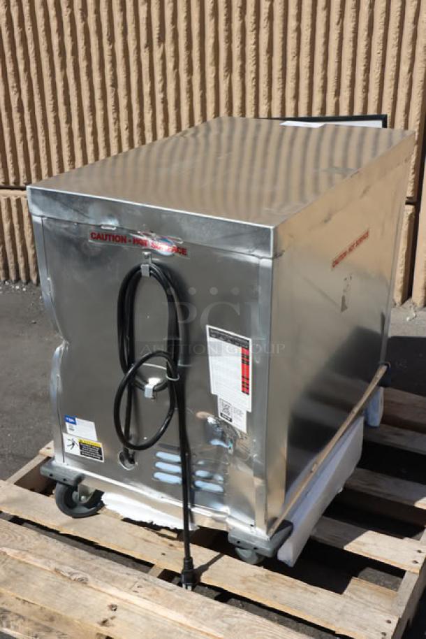 Brand new Avantco HPI-1812 undercounter heated cabinet, clear door, 120V, 1,575W, scratches on surface, on pallet.